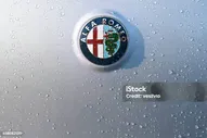 Alfa Romeo — стоковые фотографии и другие картинки Alfa Romeo - Alfa Romeo, Логотип, Автомобиль